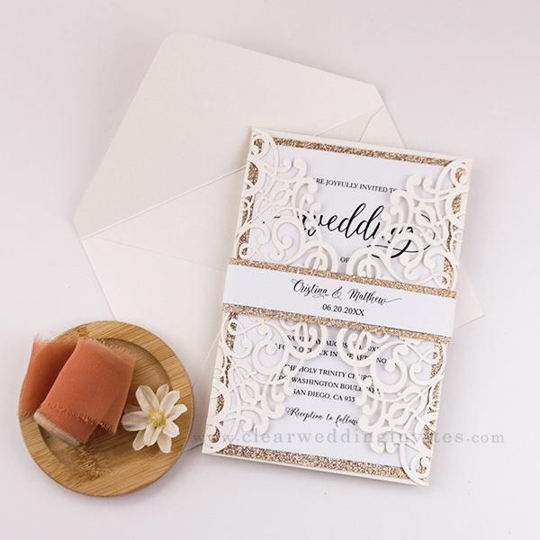 Ivory neutral tones laser cut wedding invitations with gold glittery belly band CWIL68